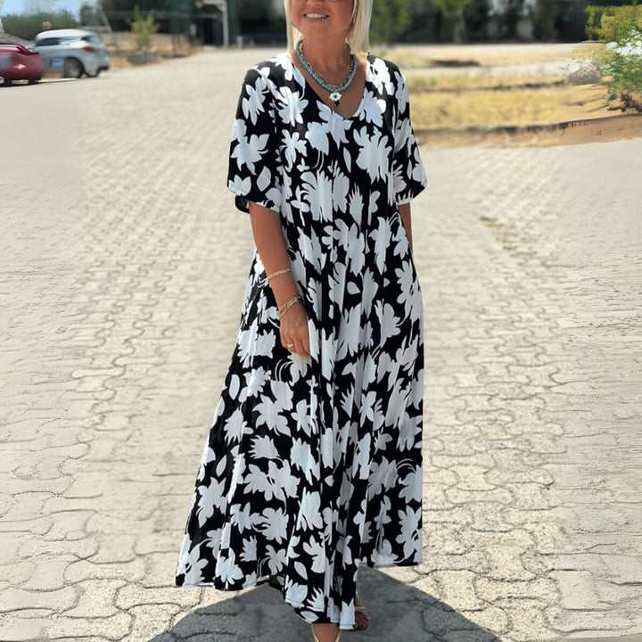 Dorotea | Weit geschnittenes Maxikleid mit Blumenprint und V-Ausschnitt für Frauen